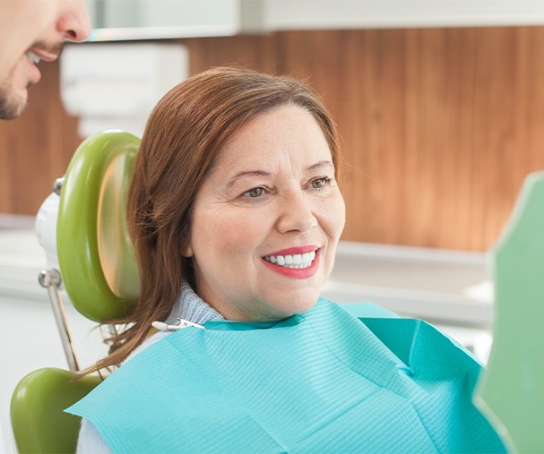 Woman smiling at the dentist