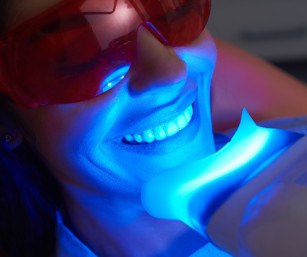 Someone getting in-office teeth whitening